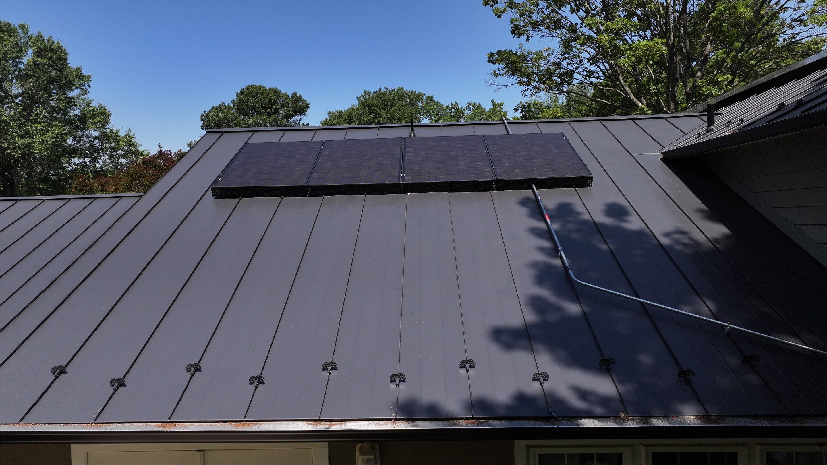 Metal Roof + REC Panels: A Solar Upgrade by American Home Contractors