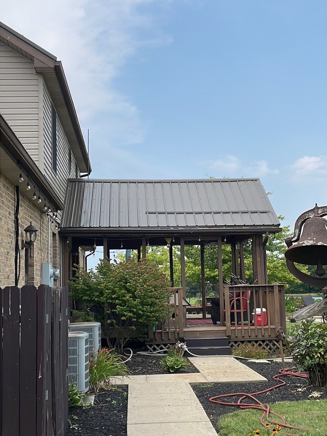 Residential Roofing Installation using Performance Panel Metal - Burnished Slate by RoofX 