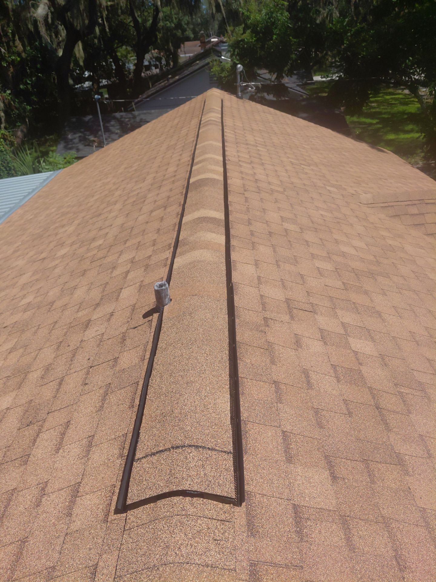 Combined Shingle and Metal Residential Roof Replacement in Leesburg Florida by Pinnacle Roofing Group