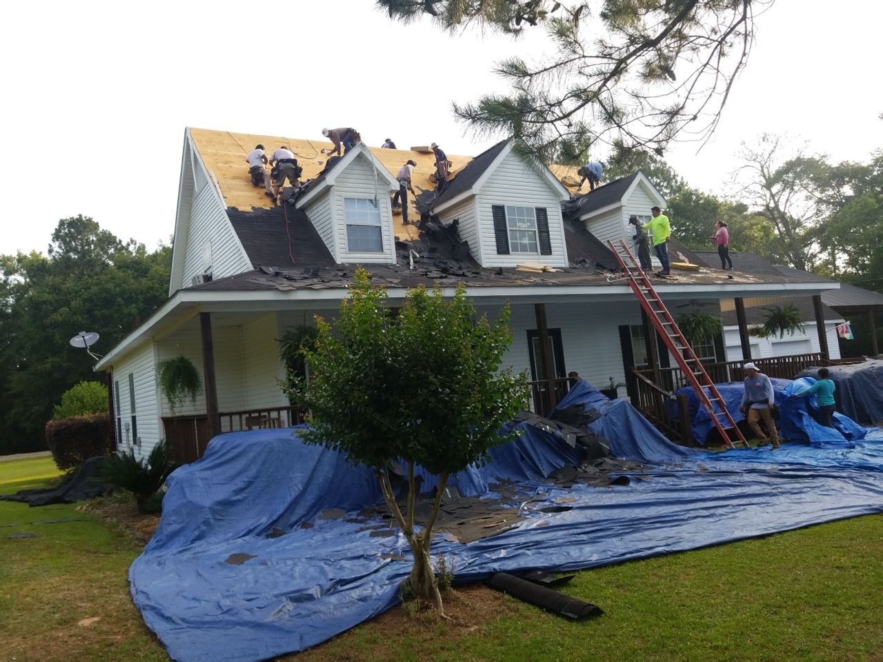Residential Roofing Installation using Roof Replacement by American Roofing & Construction LLC