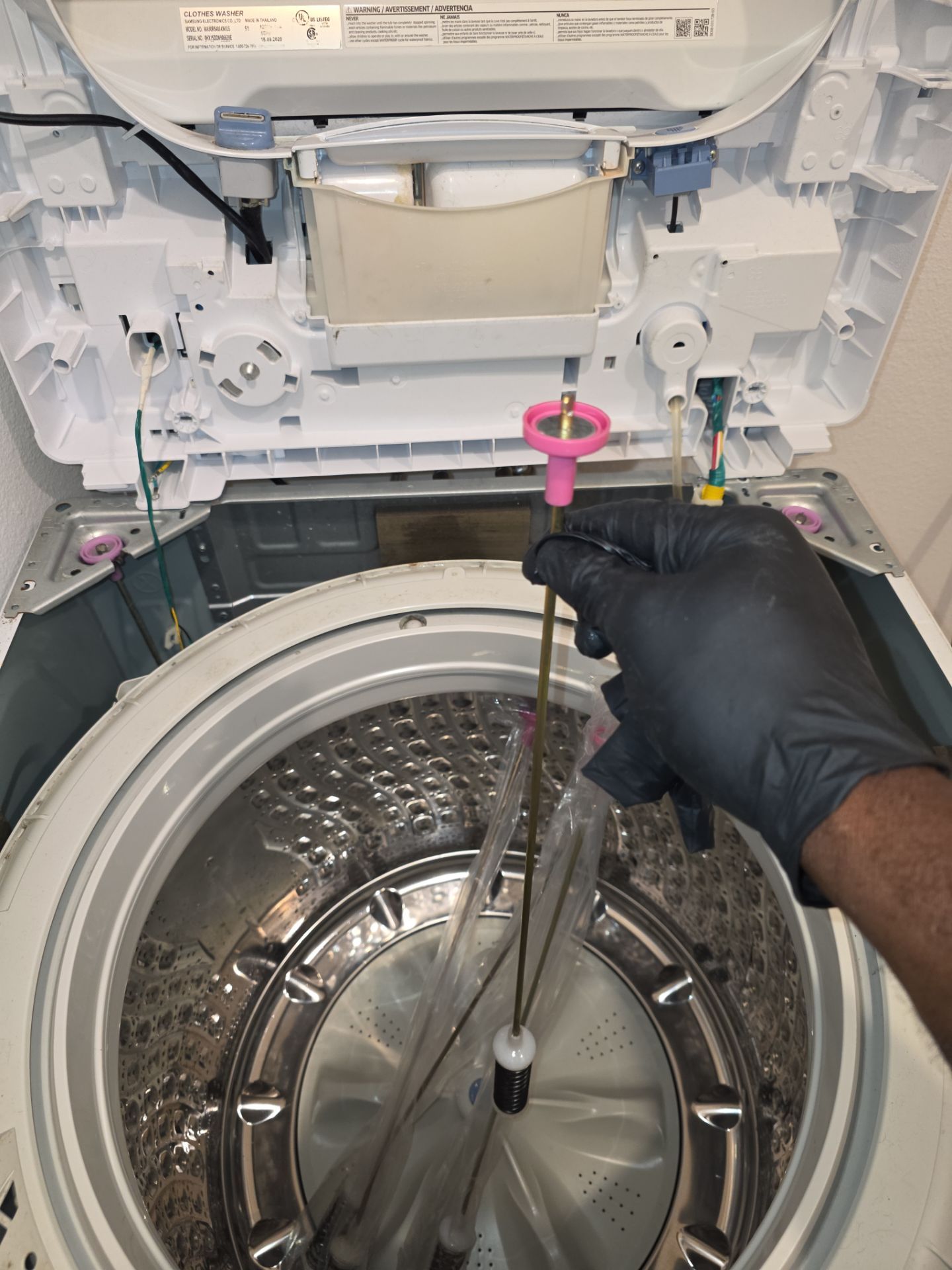 Samsung Top-Loading Washing Machine Suspension Rod Repair in Groveland by AMB-WORKS APPLIANCE REPAIR