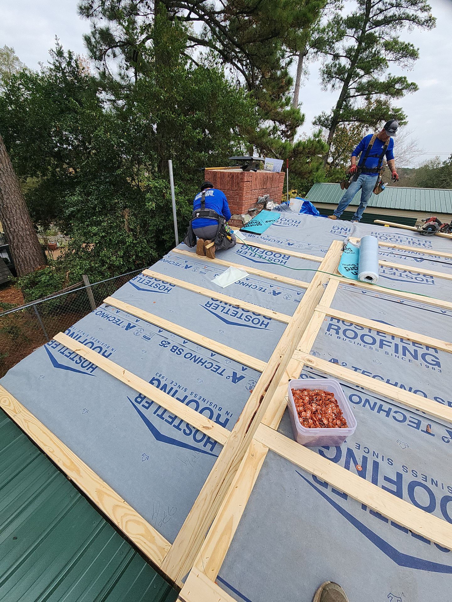 Residential Metal Roof Replacement using 26 Gauge Colored Panels by Hostetler Roofing