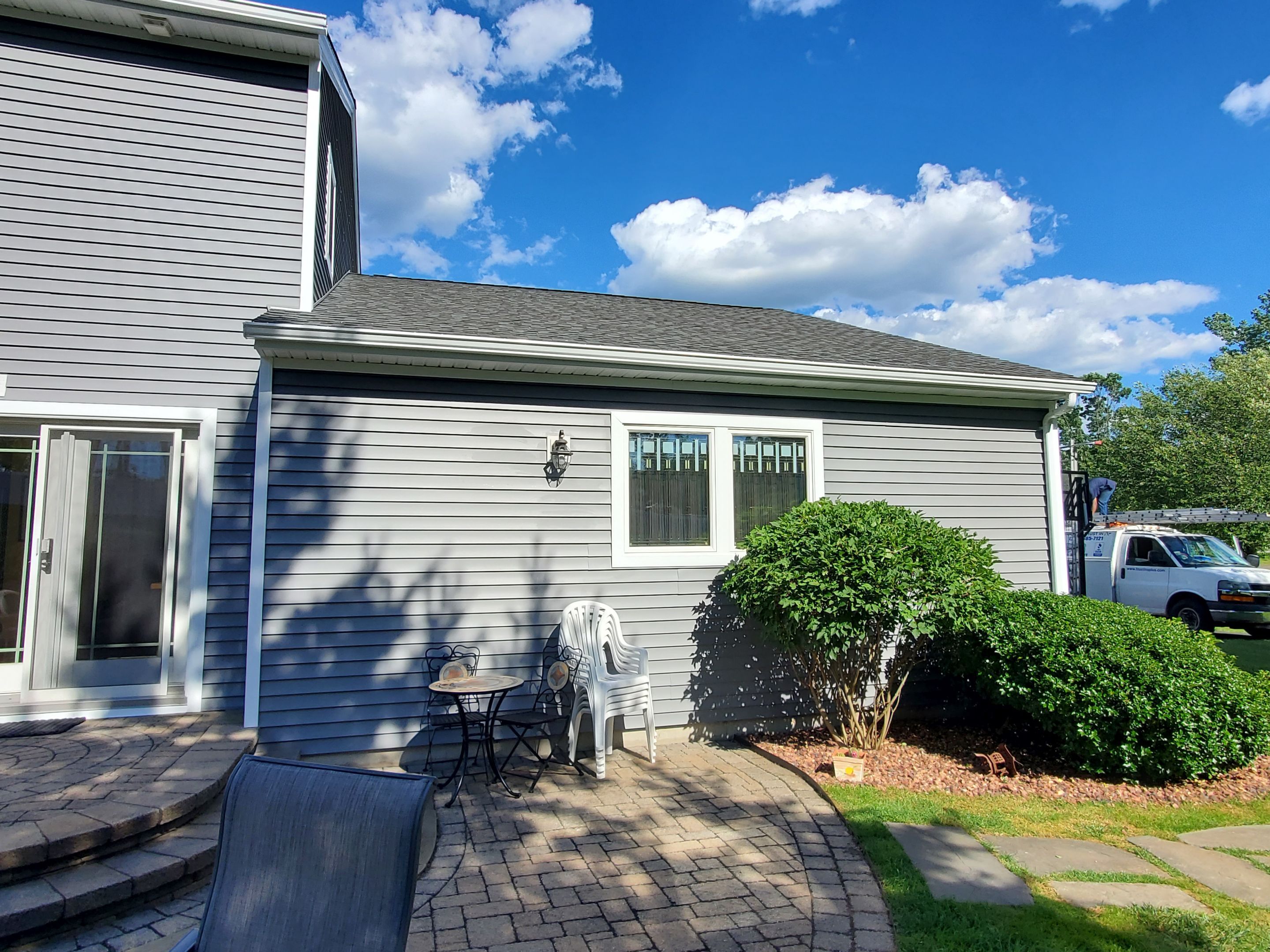 Siding Installation using Certainteed Monogram Charcoal gray and Owens Corning Versetta Stone Sterling by A Plus Exterior