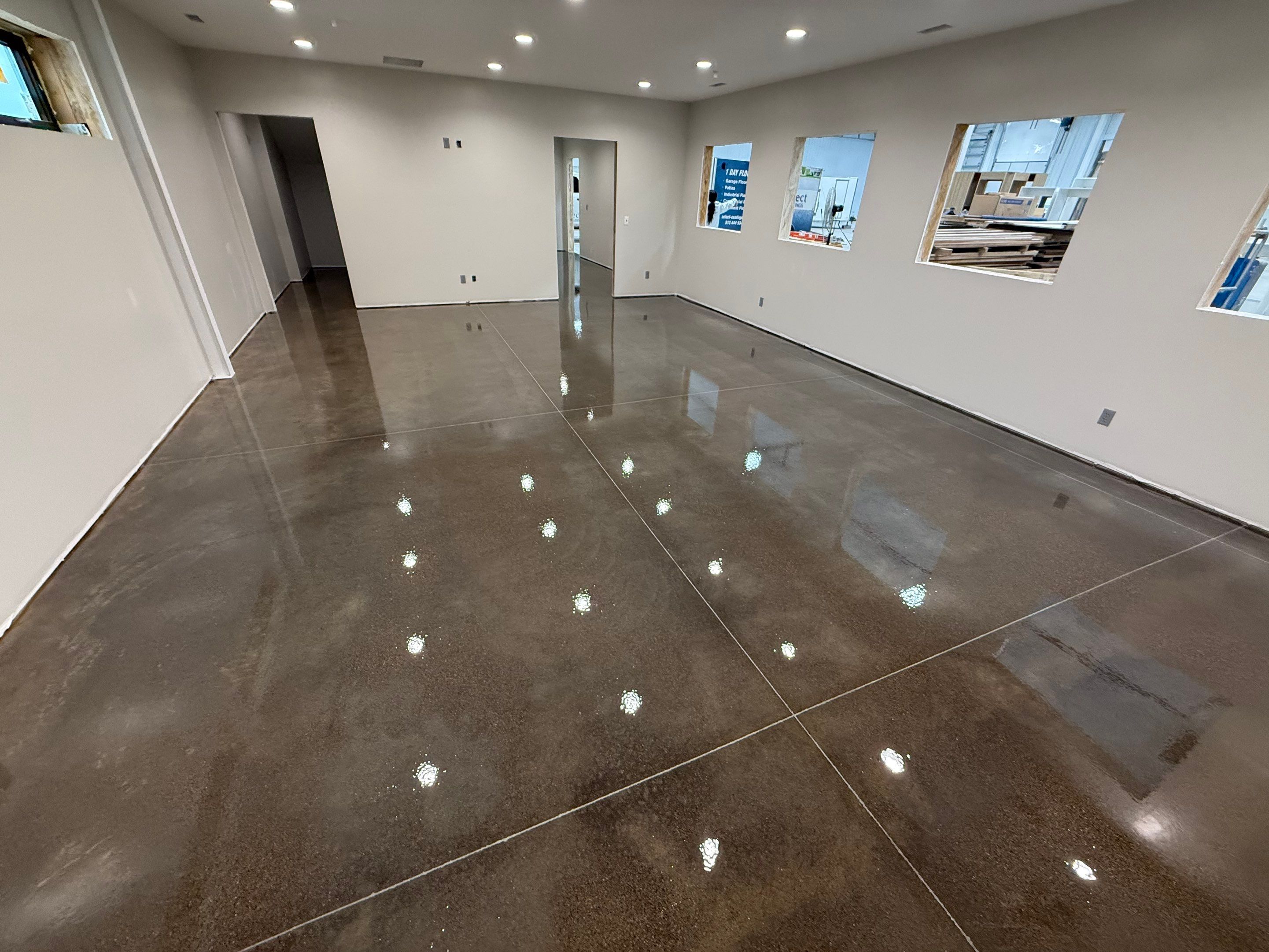 Industrial Concrete Polishing and Coating for Large Manufacturing Warehouse by Select Painting, Coatings & Garage Cabinets