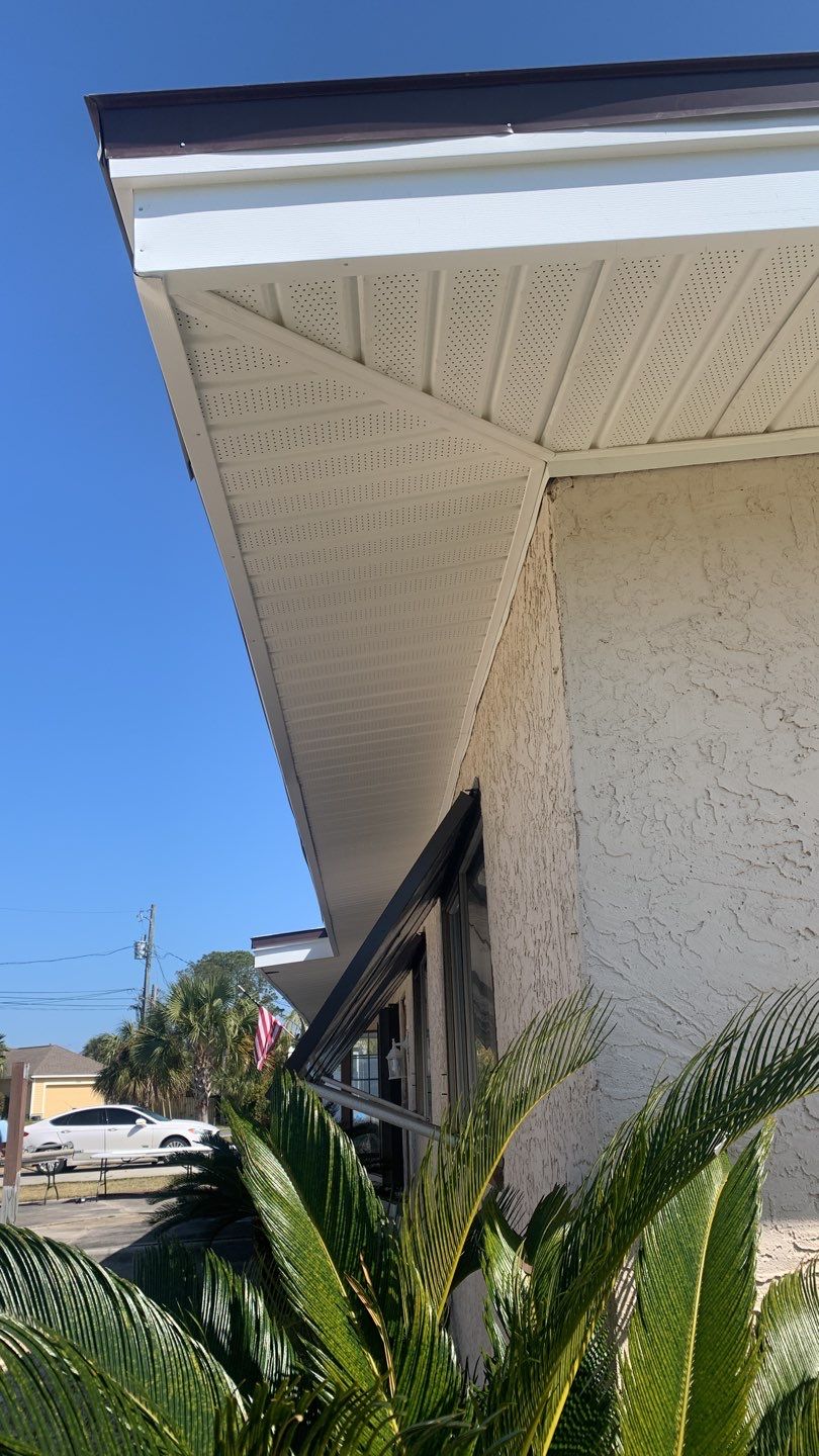 Soffit and Fascia Installation Using White Vinyl Soffit and Musket Brown Fascia by Gutter Professors