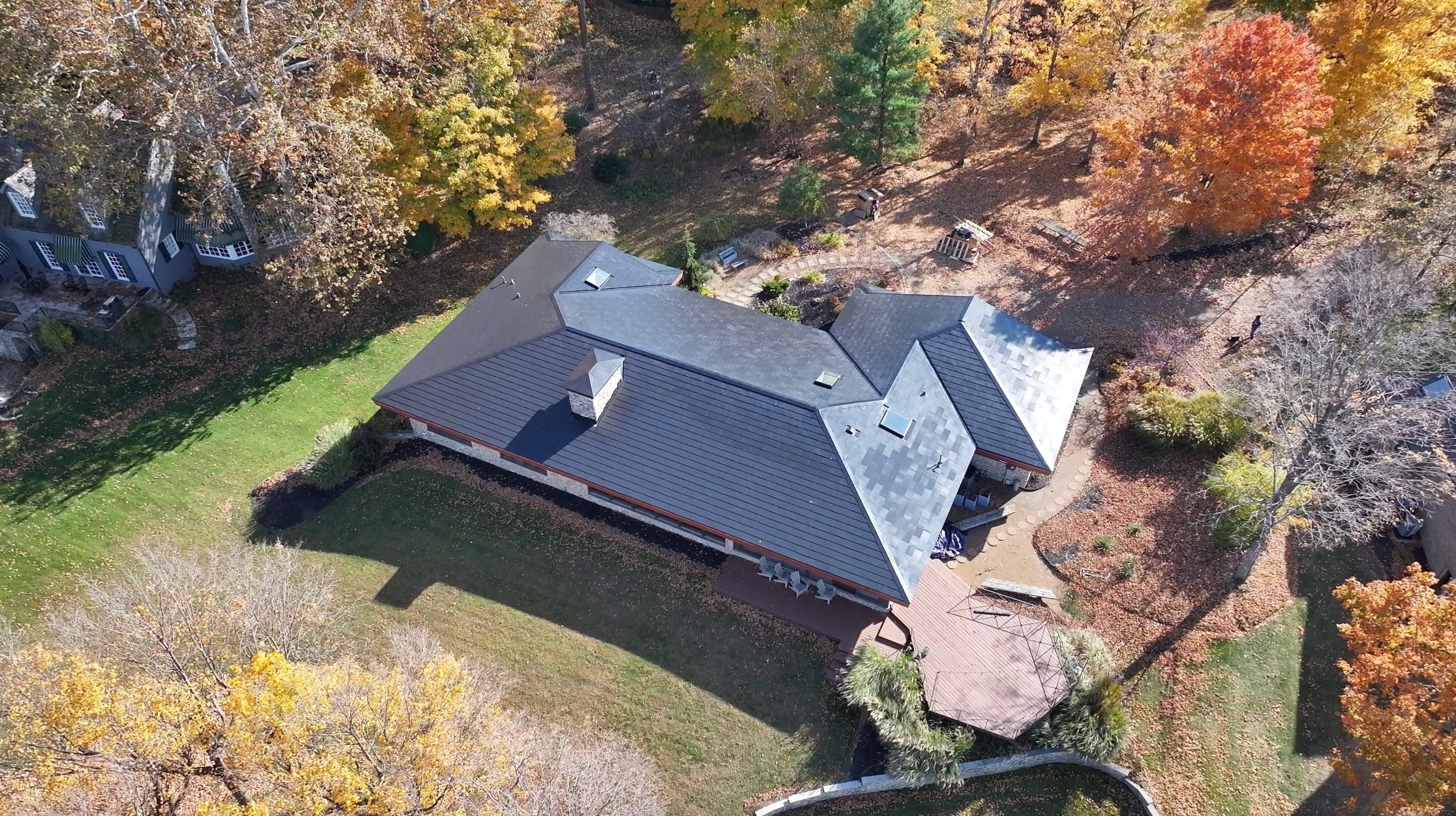 Tesla Solar Roof by Bone Dry: Family of Companies 