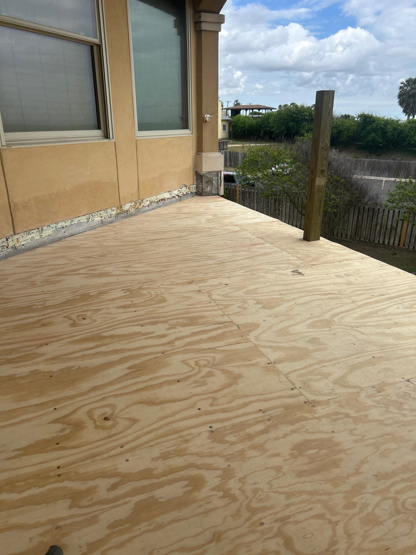 Walk Out Patio Cover by Bayfront Roofing and Construction
