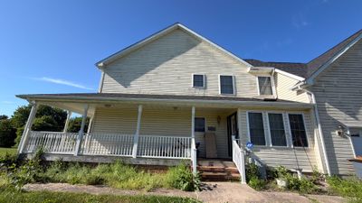 Vinyl Siding House Washing and Wood Deck Restoration in Carroll County