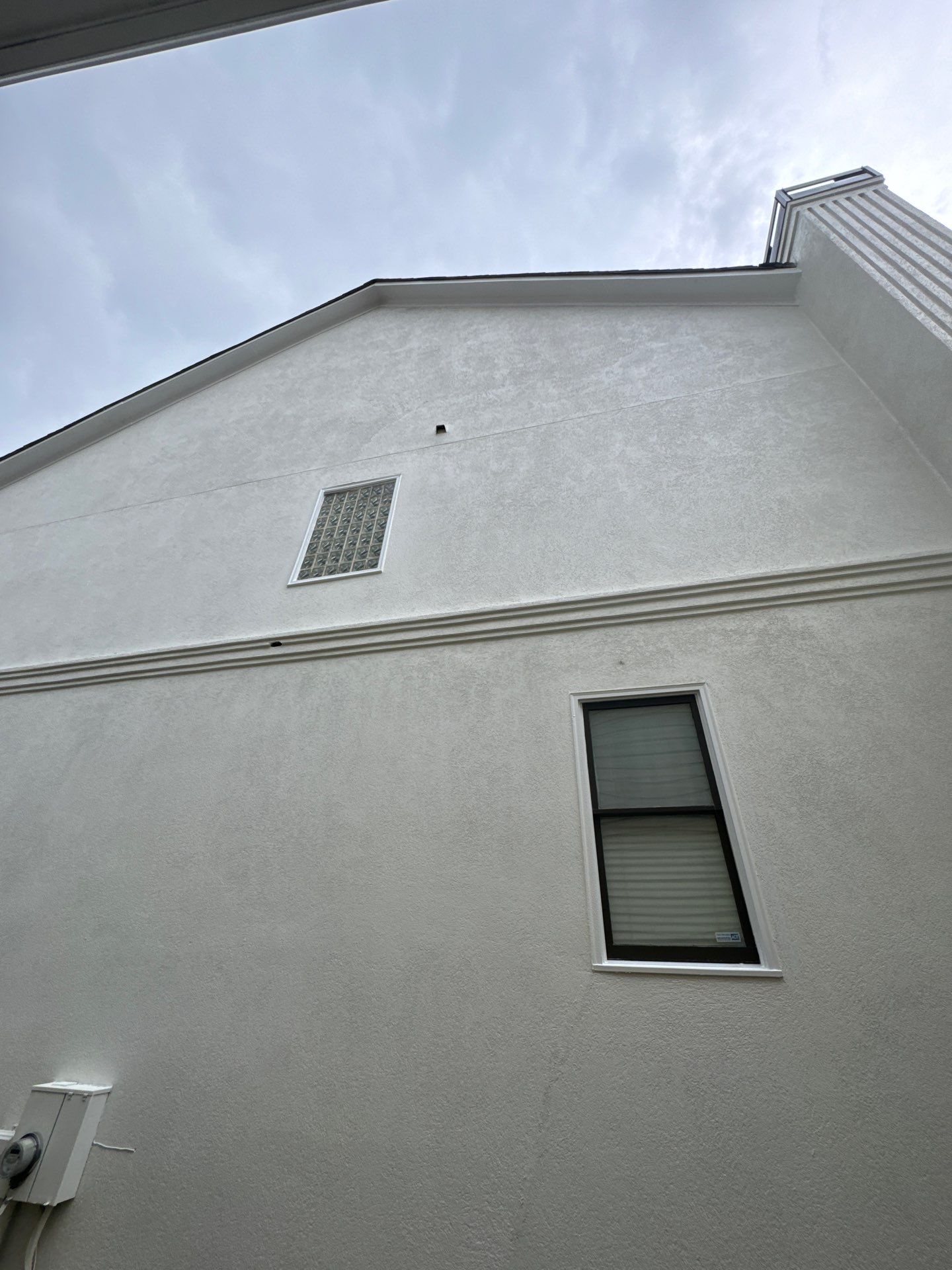 Full Exterior Stucco Painting and Wood Deck Staining in Atlanta by Swift Home Renovations