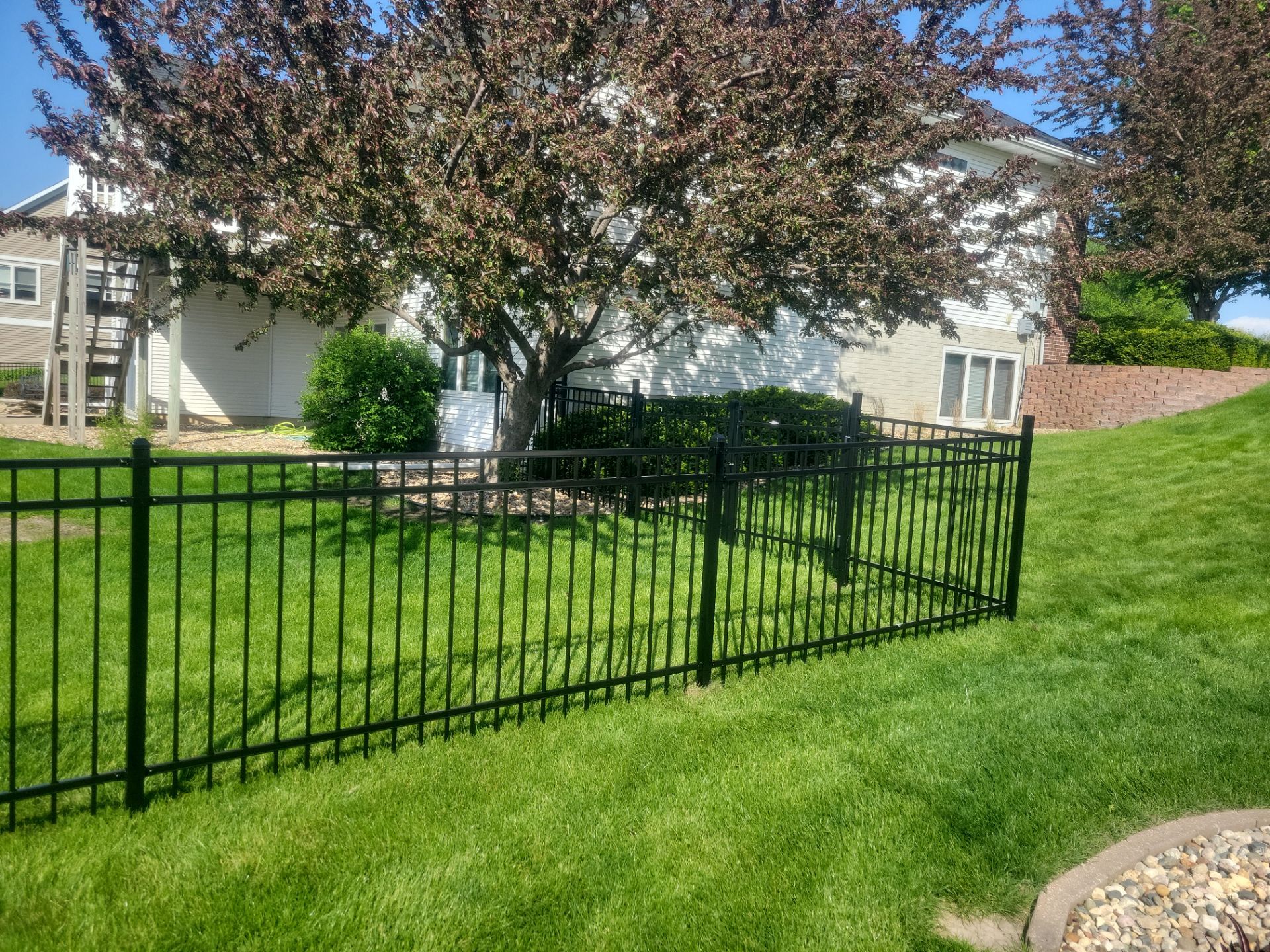 Black Ornamental Metal Picket Fence Installation in Waterloo by Perfect Picket Fence and Stain