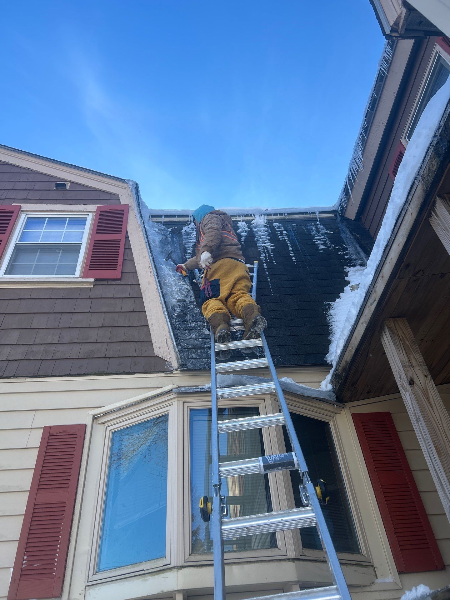 Ice dam removal by Mighty Dog Roofing of Greater Middlesex County
