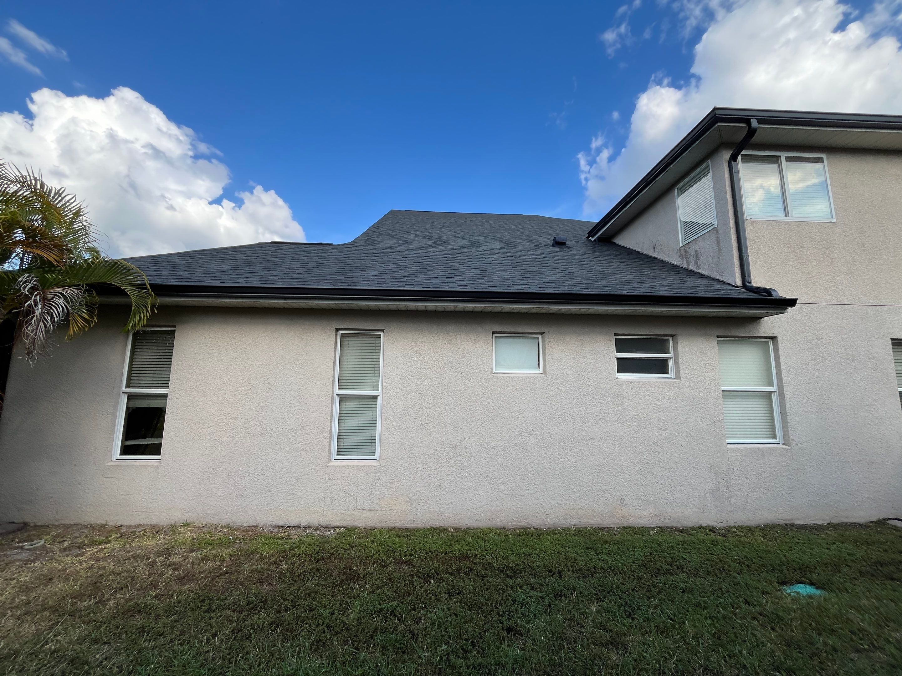Black 6-inch Seamless Gutters for Modern Ellenton Homes FL by Gutter Professors