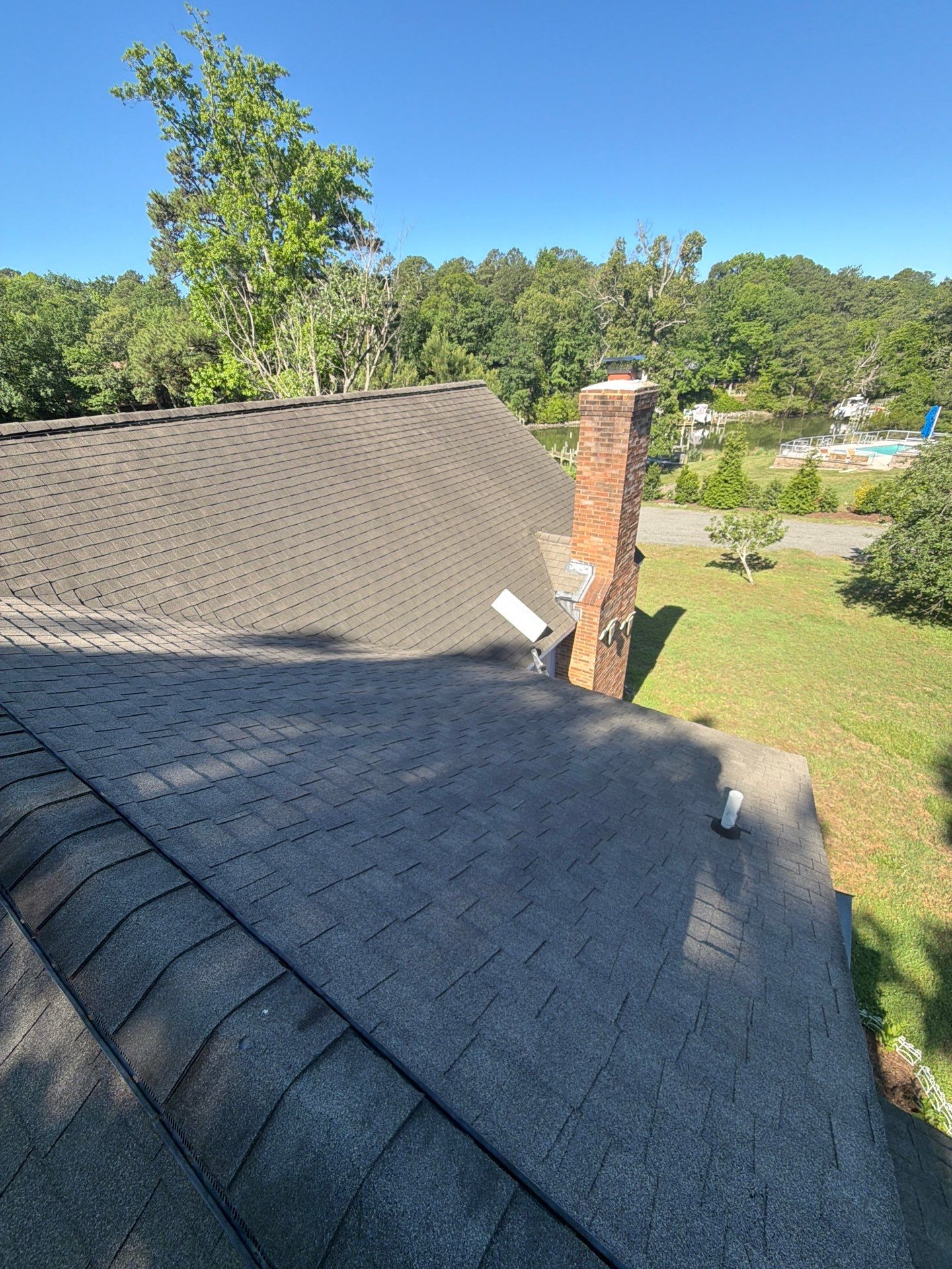 Complete Asphalt Shingle Roof Replacement and Sheathing Repair in Deltaville by Cade Construction