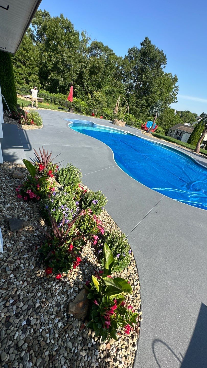 Twilight Pool Deck / Patio Project in Beaver falls by Floors in a Day, Inc