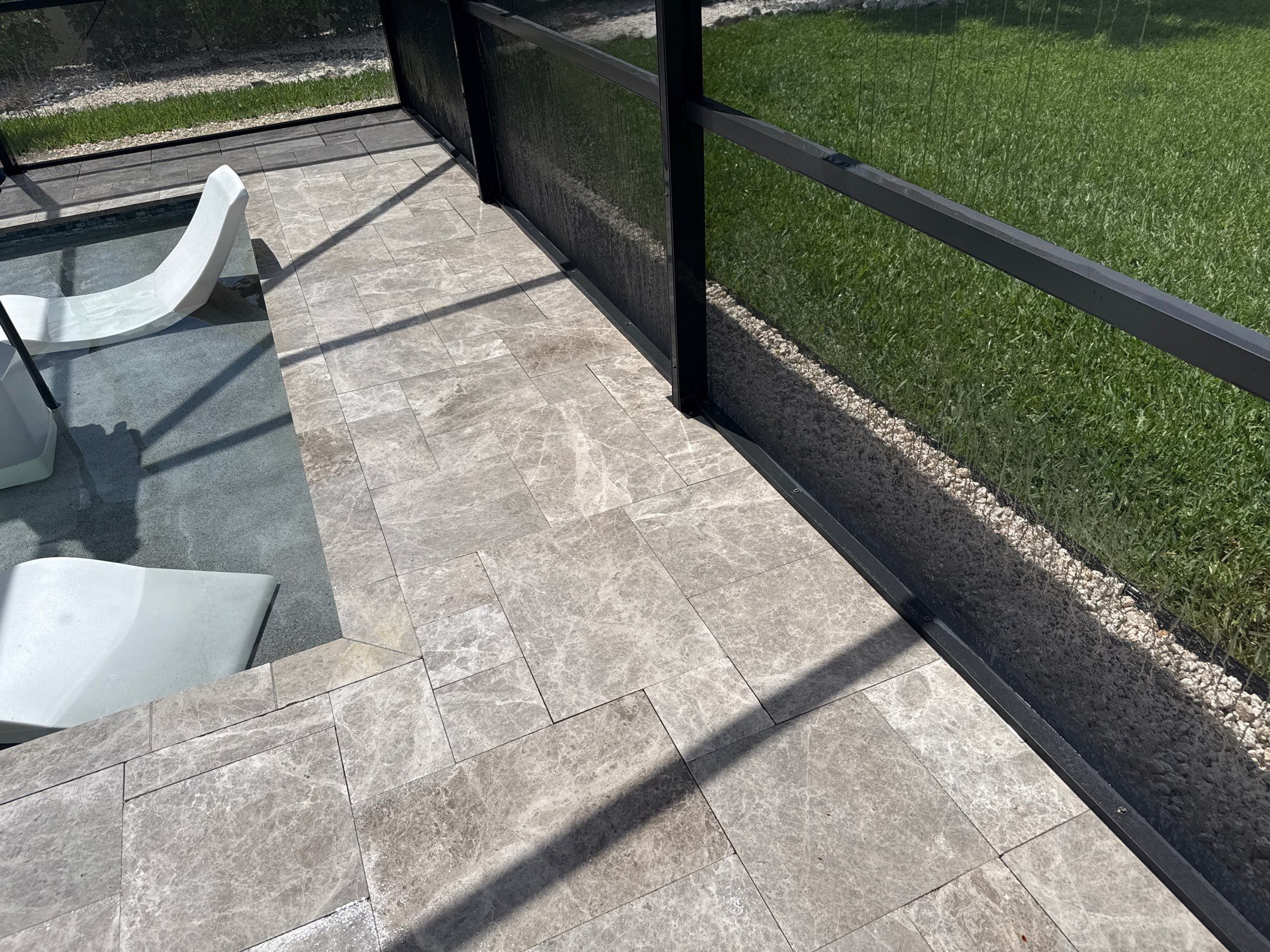 Travertine Pool Deck, Lanai & Screen Enclosure Cleaning Near Manatee River | Bradenton, FL by Sunshine AquaWash