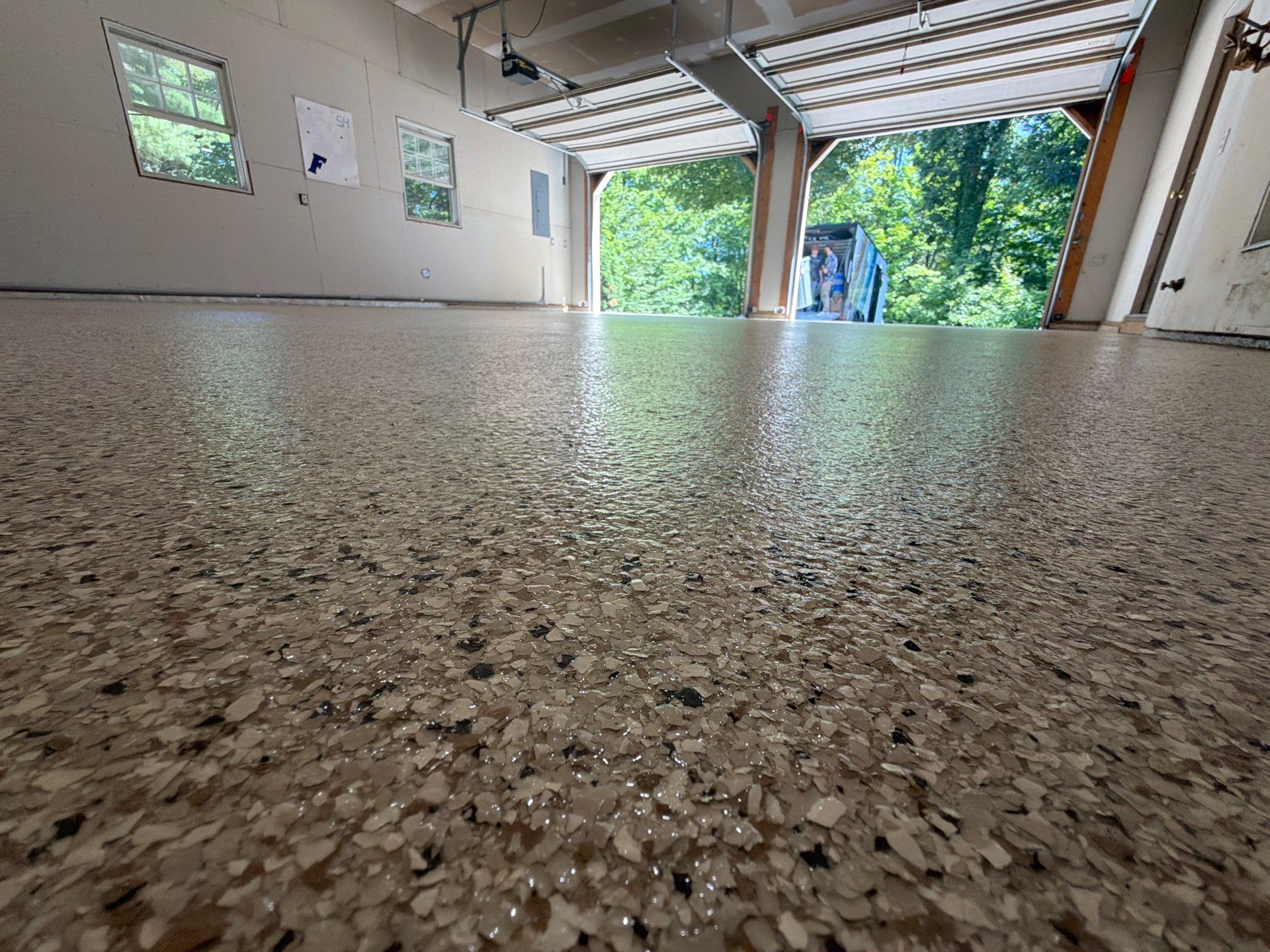 Garage Epoxy Floor Coating with Speckled Flake Finish in Fruitport by Gordon Painting
