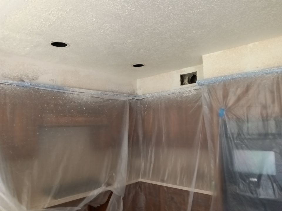 Interior and exterior painting project by Roof Concepts Construction