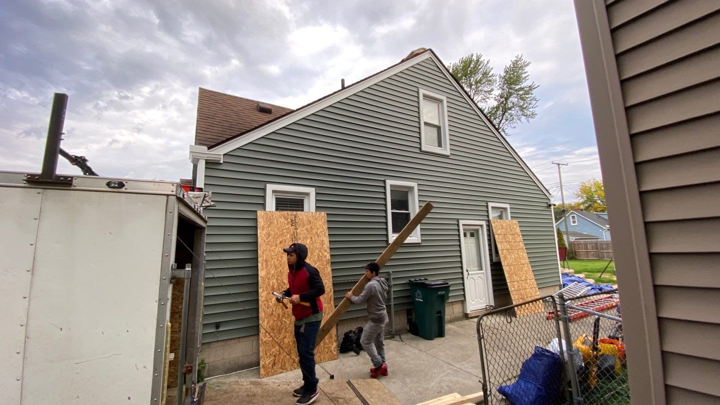 Siding Replacement using CertainTeed Restoration Classic D5 Forest Green by 180 Contractors