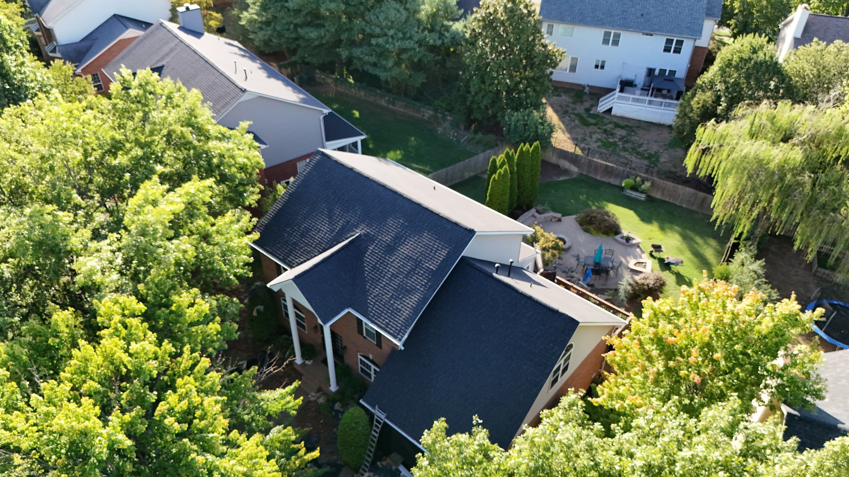 Charcoal Black Re-Roof by Royal House LLC