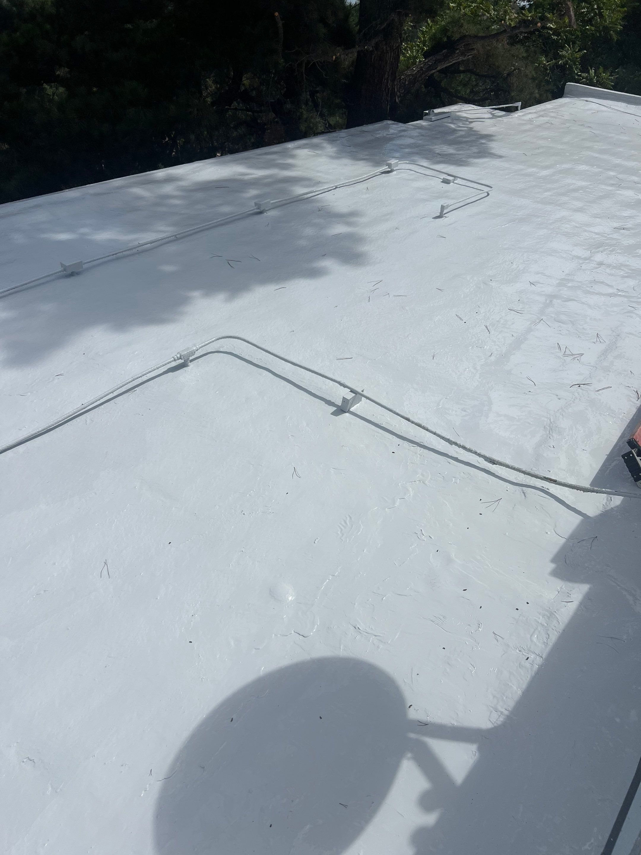 Silicone Membrane Re-coating  by Hull Brothers Roofing