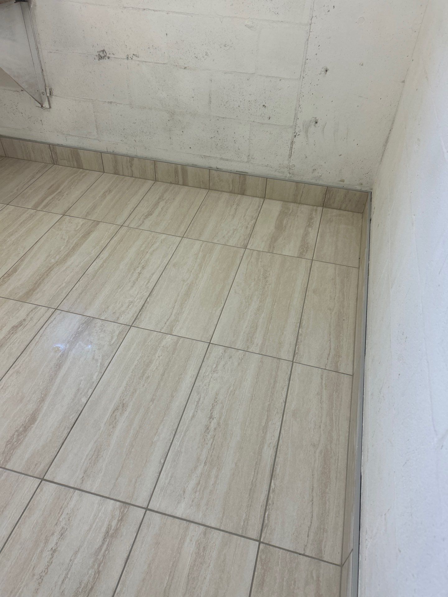 Laundry Tile Upgrade  by Vrmmm Flooring