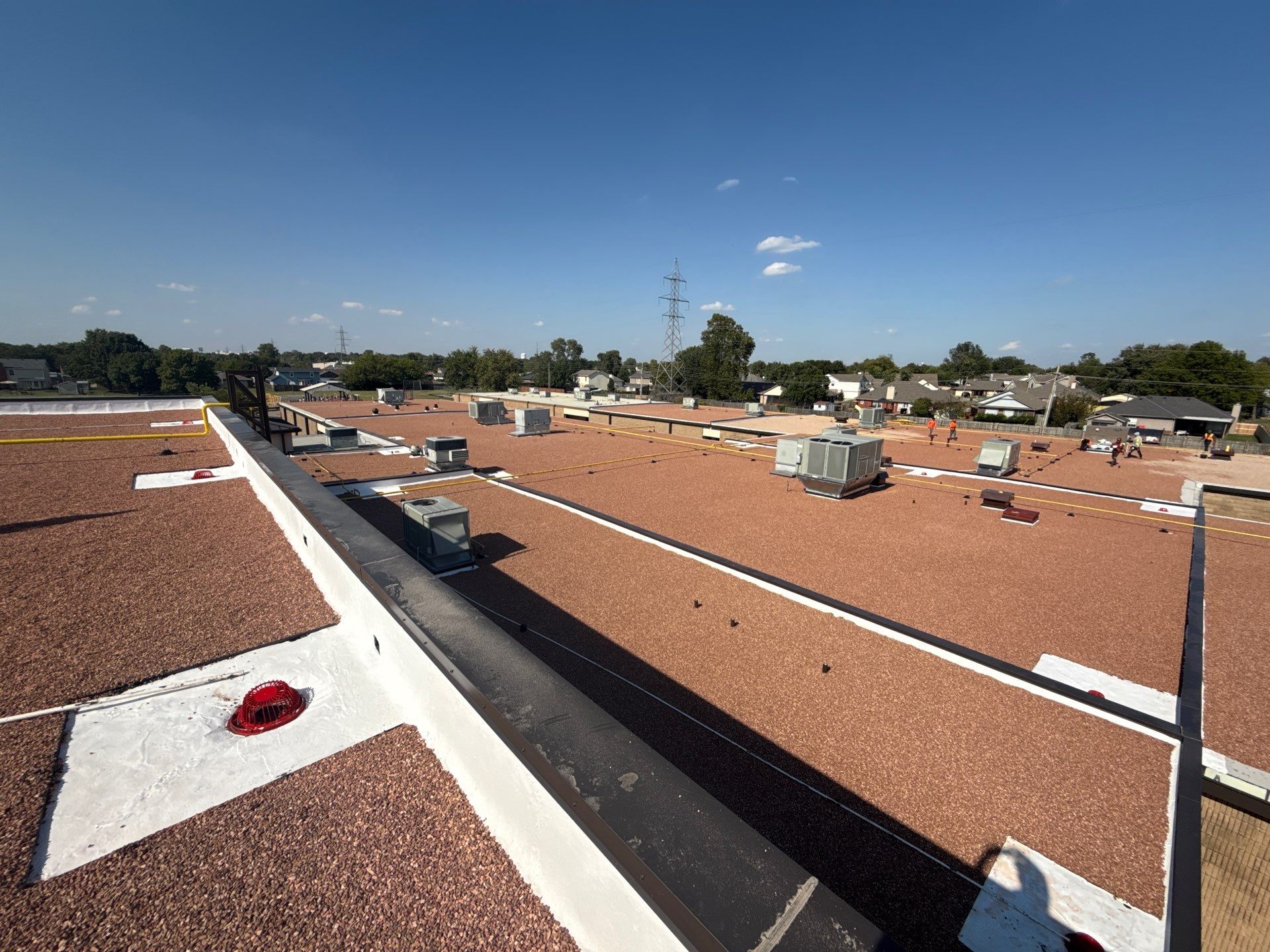 Mills Elementary School Commercial Re-Roof and Moisture Protection by Secondary Rhodes