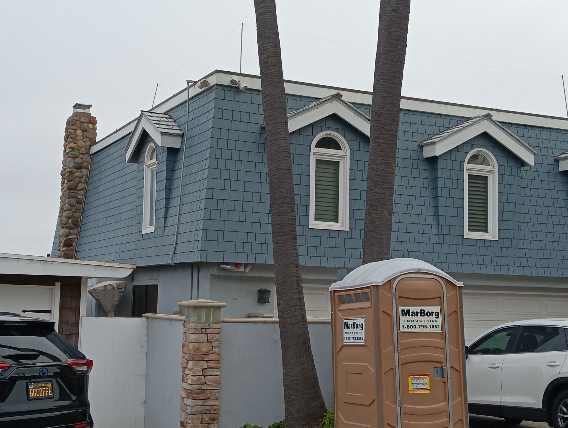 Pre-finish shingles by New Era Siding Inc 