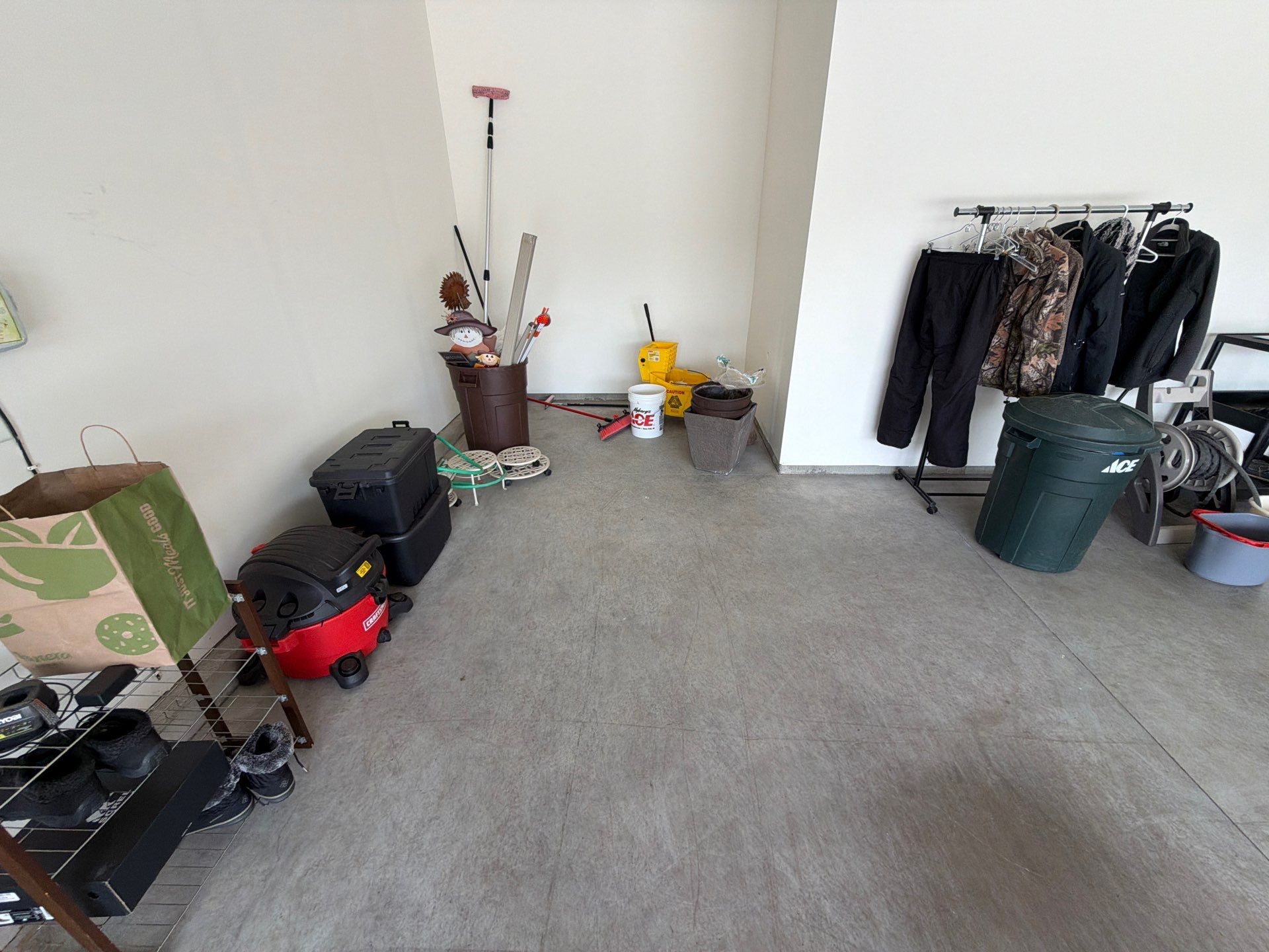 Cabin Fever Garage Floor Coating in Sioux Falls by Select Painting, Coatings & Garage Cabinets