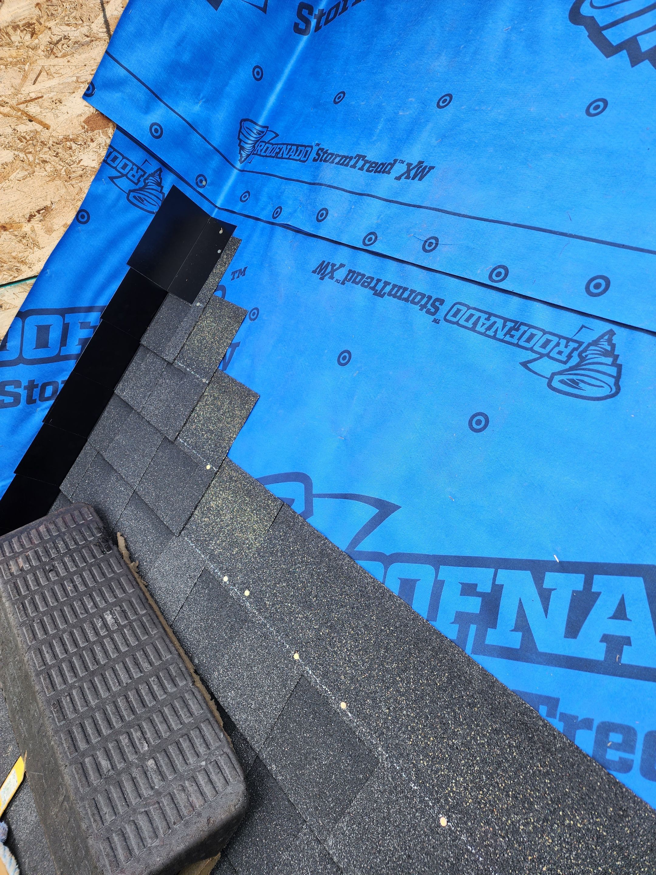 Residential Roofing Installation using OC Oakridge shingles by Top Notch Roofing Inc