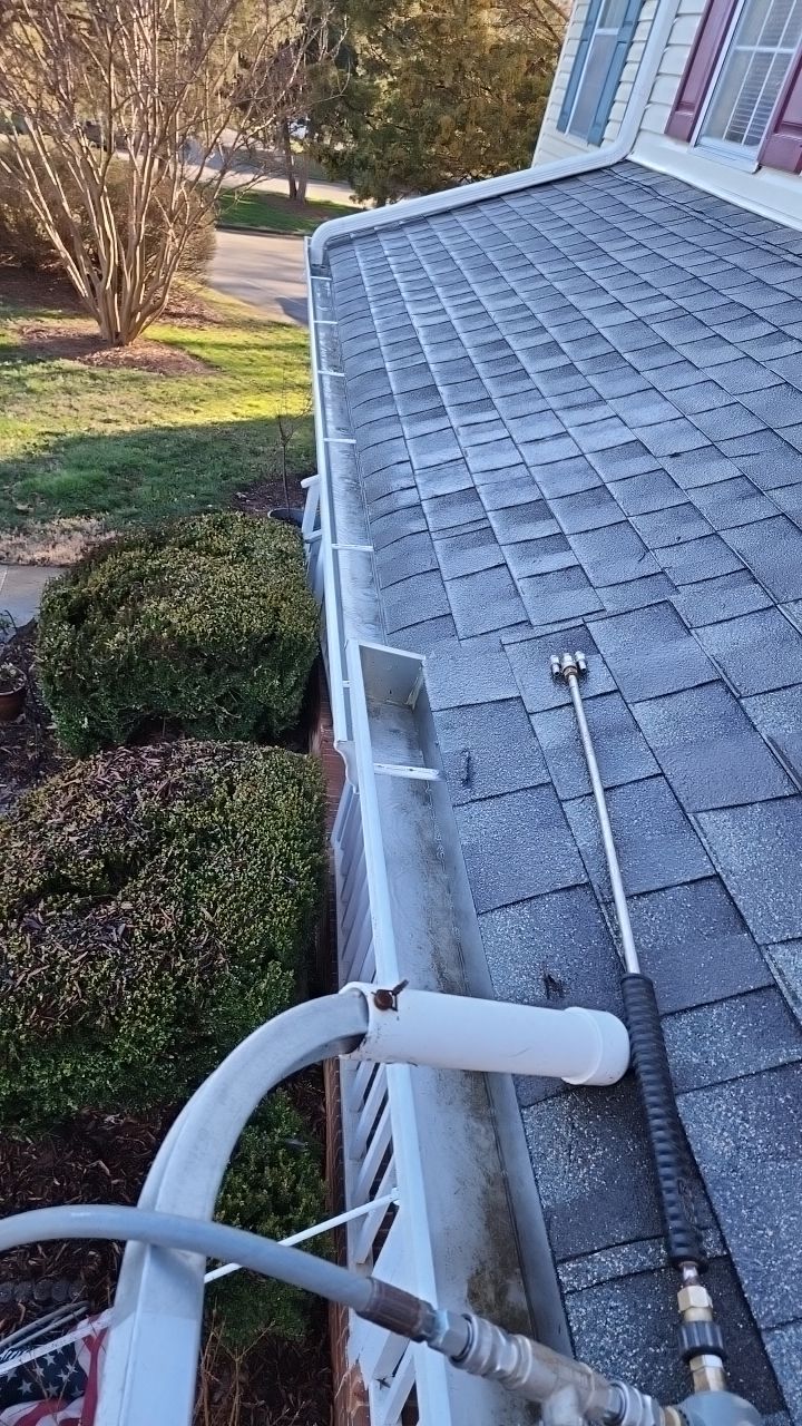 Gutter Cleaning using water by Power Wash Masters LLC