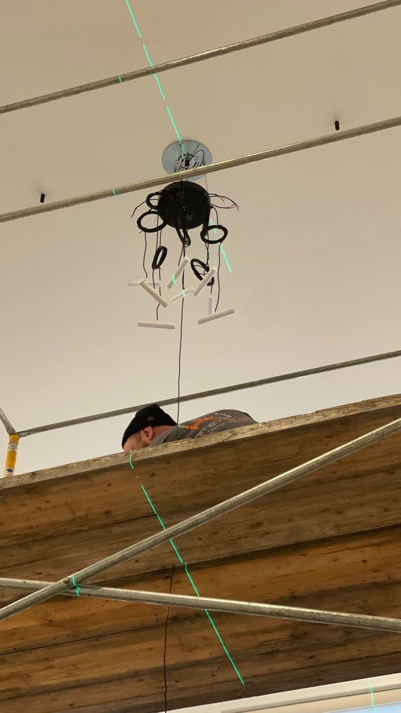 Chandelier Install  by HomeWerkes Design & Build