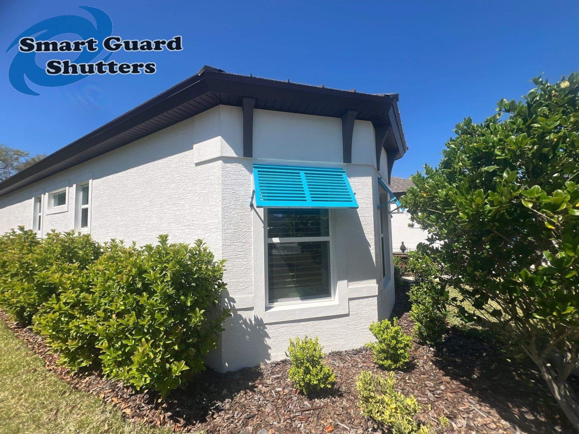 Decorative Bahamas in Throw Back Blue  by Smart Guard Shutters