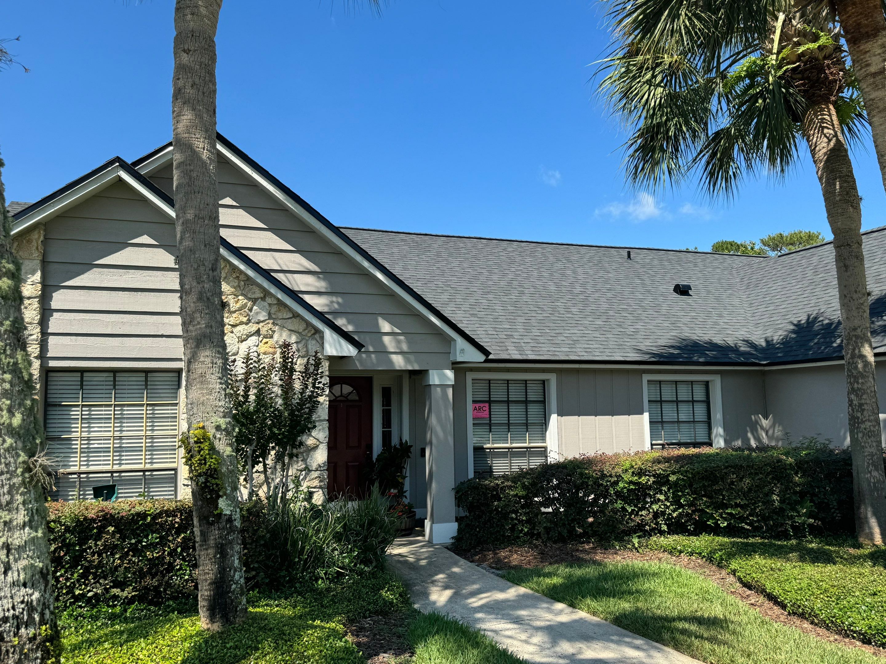 Asphalt Architectural Shingle Roof Replacement and Solar Integration in Longwood by Fortified Roofing Solutions Corp.
