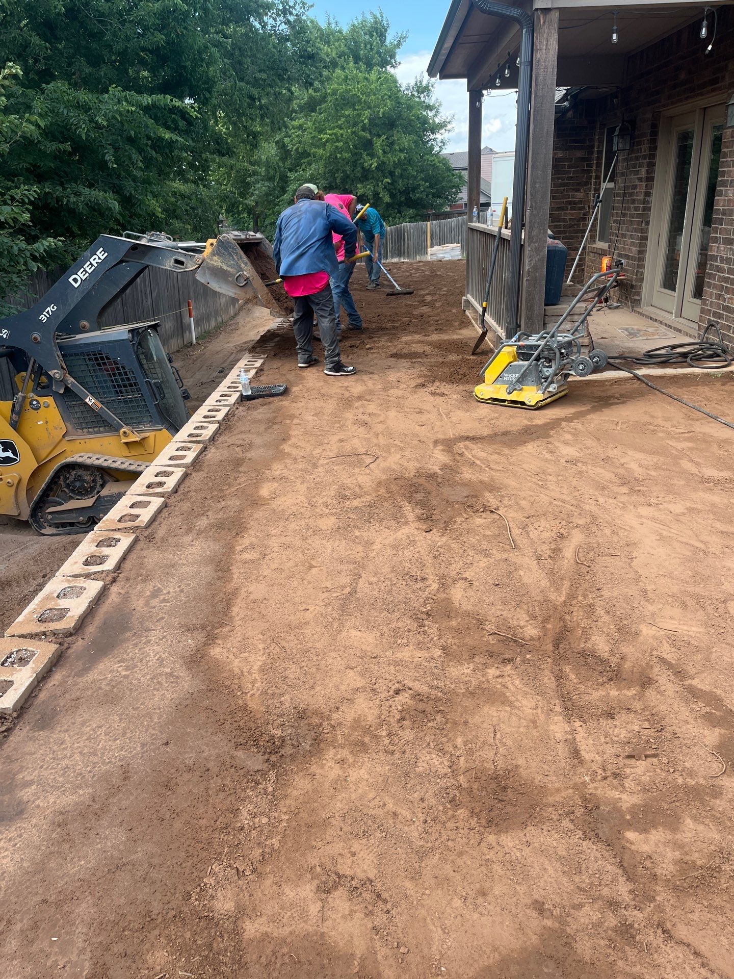 Custom Segmental Block Retaining Wall and Sod Installation in Lawton by Clays Services Inc