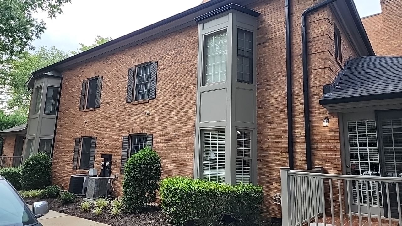 building clean using cleaner by Power Wash Masters LLC