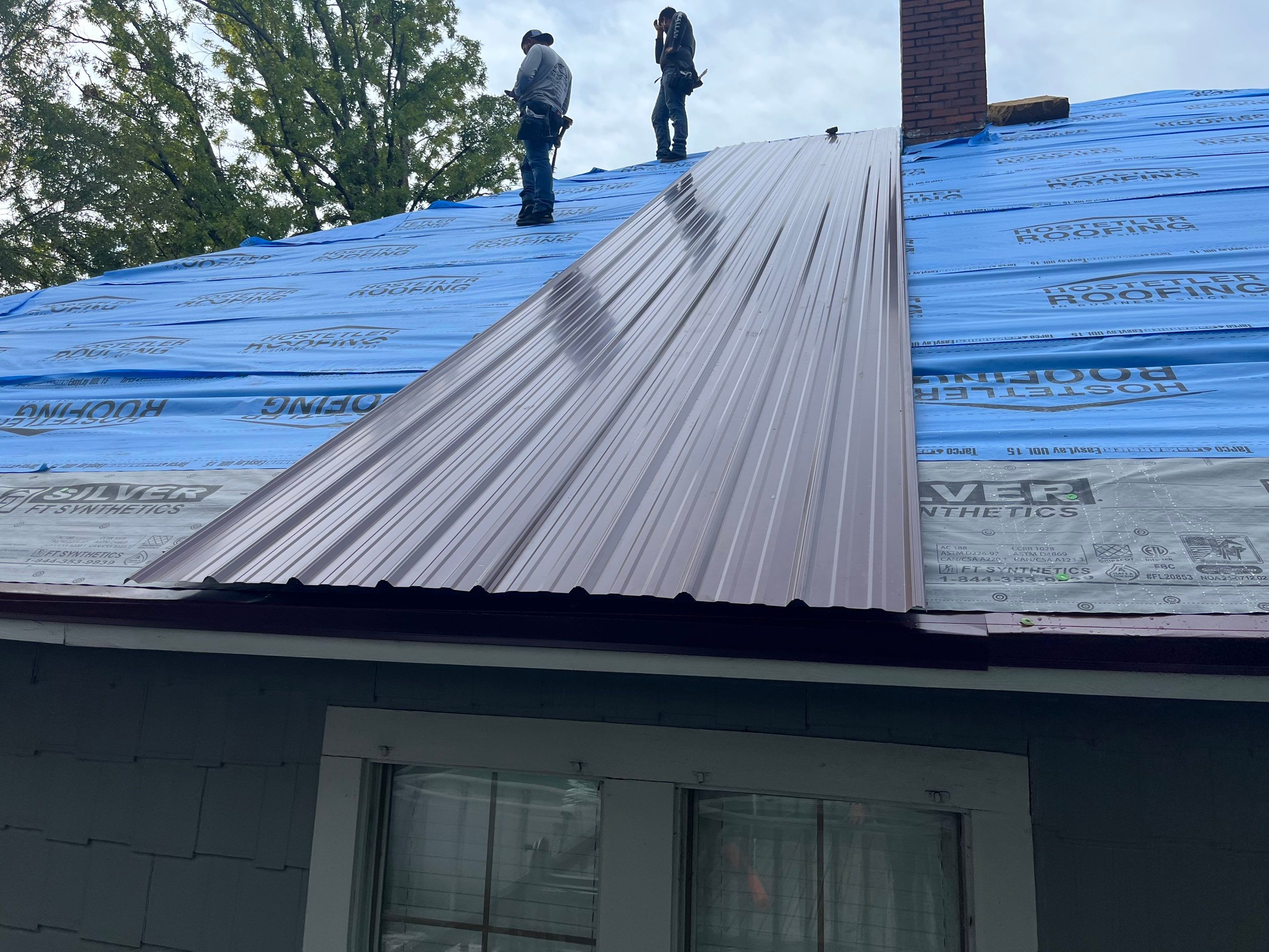 Residential Metal Roof Replacement using Reed's Metals: Colored Residental Panel (Burgundy) by Hostetler Roofing