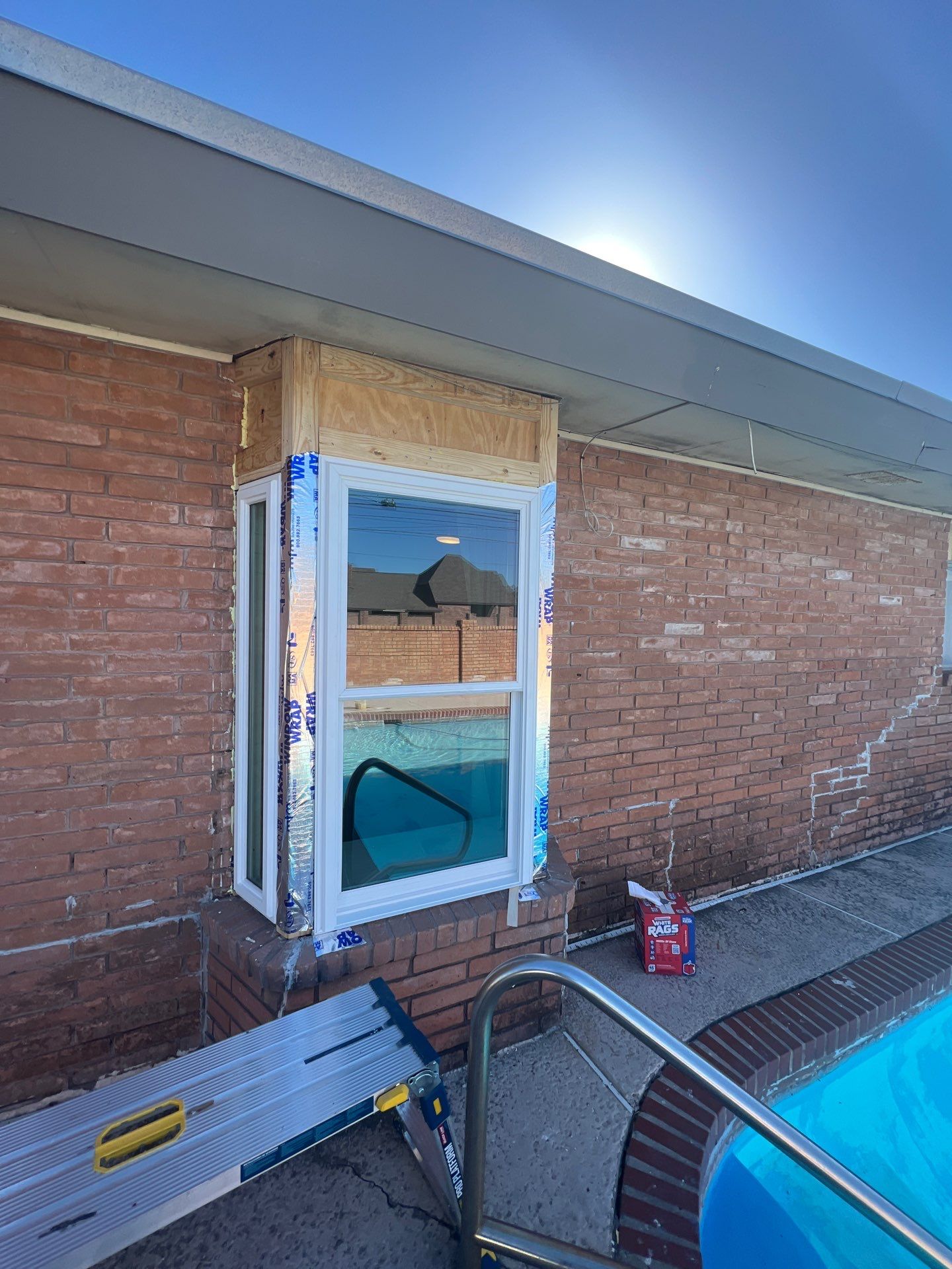 Windows in Brick with a Bay Window by Bayfront Roofing and Construction