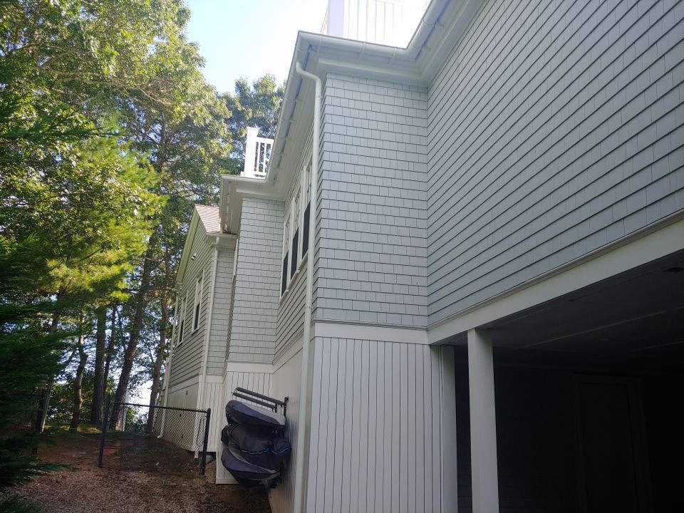 Gutter Installation using 6" Half Round Aluminum Gutter over Crown Moulding by Gutter Pro Enterprises