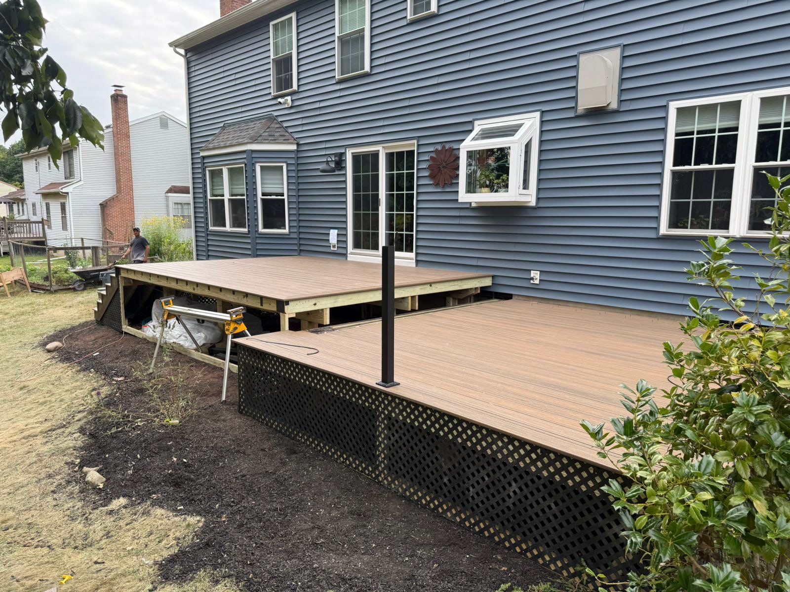 Deck resurface with Trex and cable rails by deck guardian