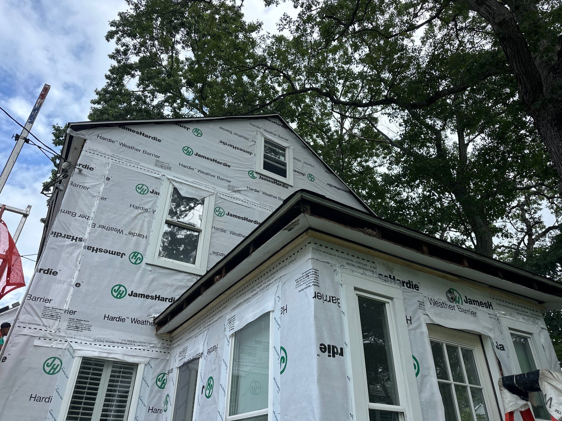 James Hardie Lap Siding Installation in Chelmsford, MA by Mighty Dog Roofing of Greater Middlesex County