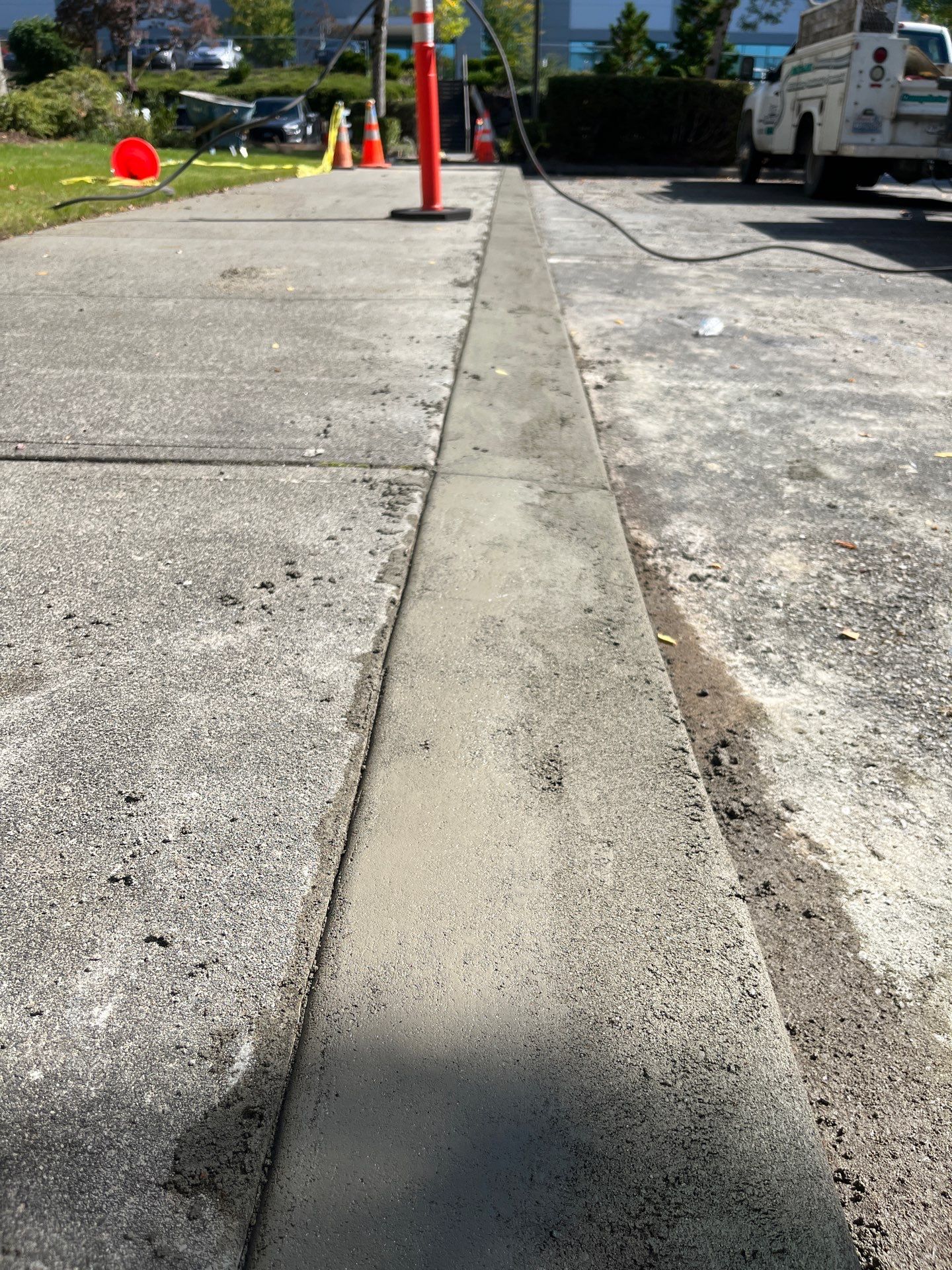 Kidder Matthews | Parking Lot Sealcoating & Striping with Concrete Curb & Patch Repairs  by Jireh Asphalt & Concrete Inc 