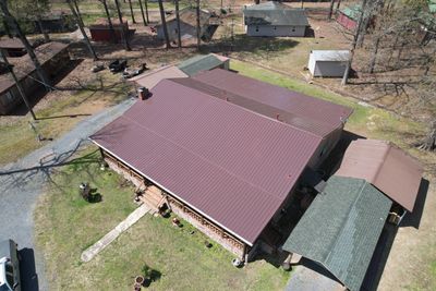 Residential Roofing Installation using 29 Gauge Colored Metal