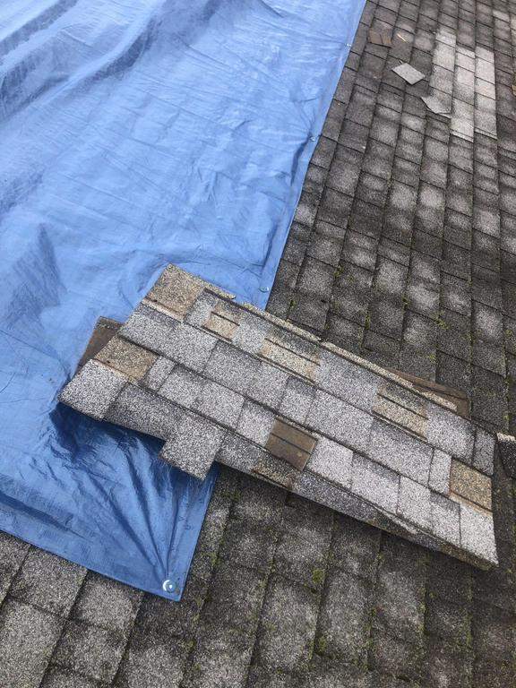 Storm damage roof replacement by Nitro Roofing and Construction