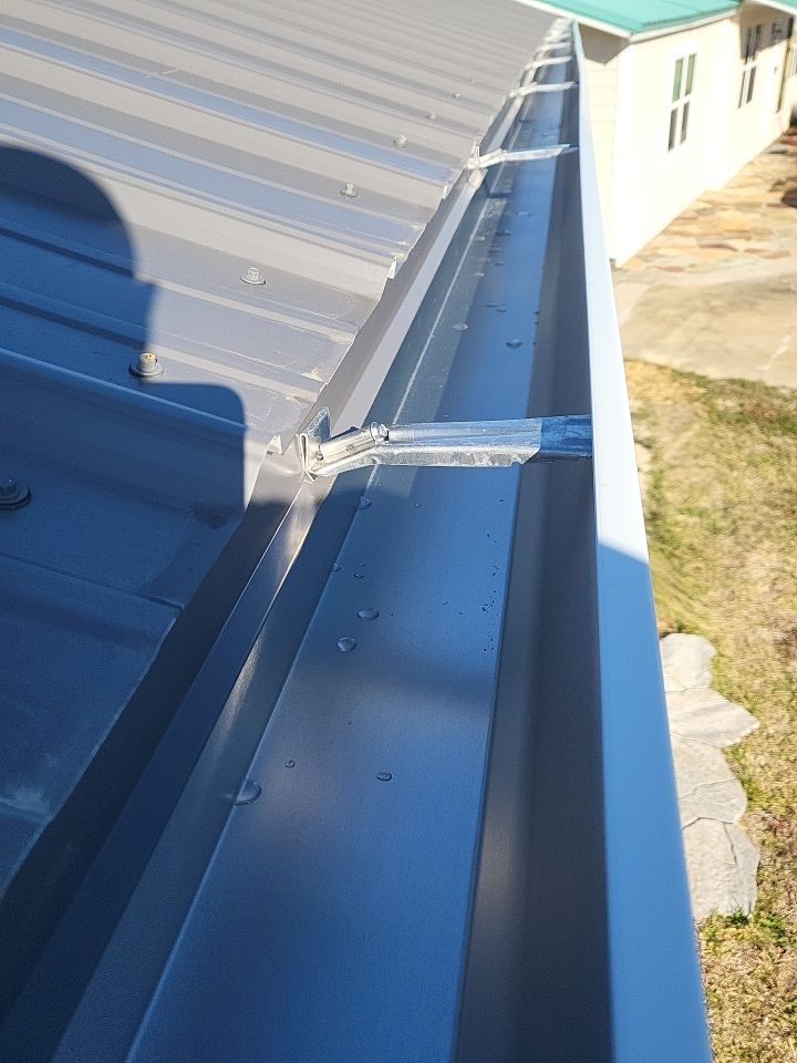 Gutter Installation using K-Style White Seamless Gutters by Gutter Professors