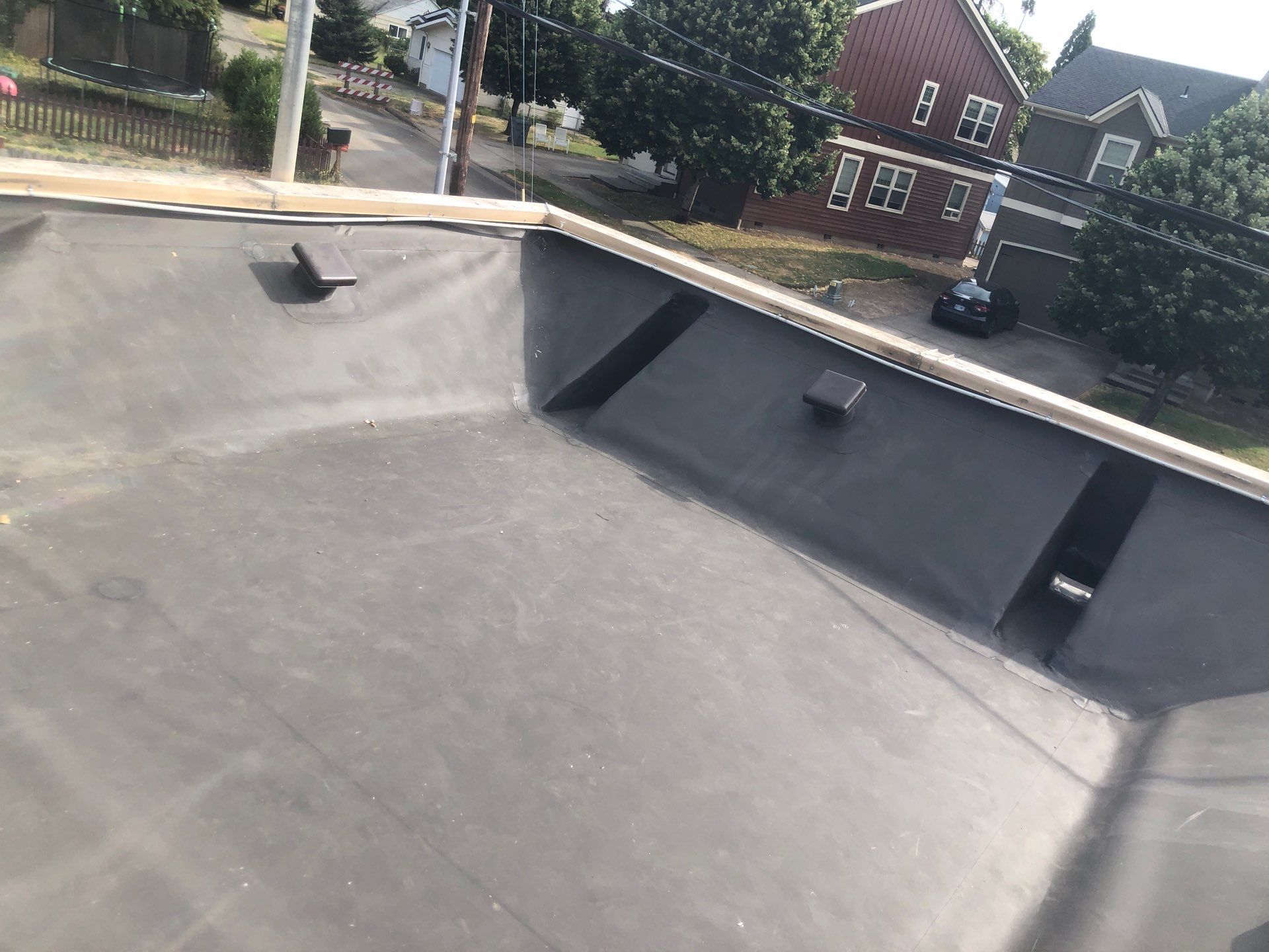 Commercial Flat Roof Installation using Bruce and Dana Snap Lock Metal (Color: Brown) by Orezona Building & Roofing Company, Inc.