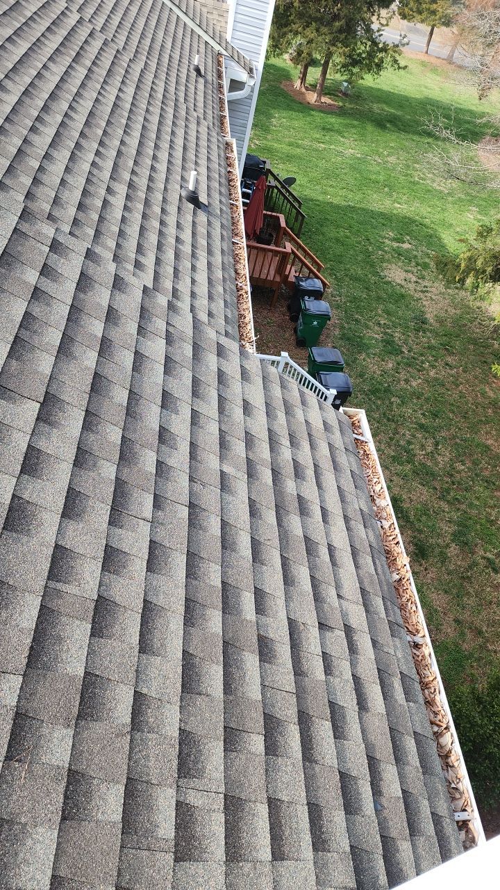 Gutter Cleaning using water by Power Wash Masters LLC