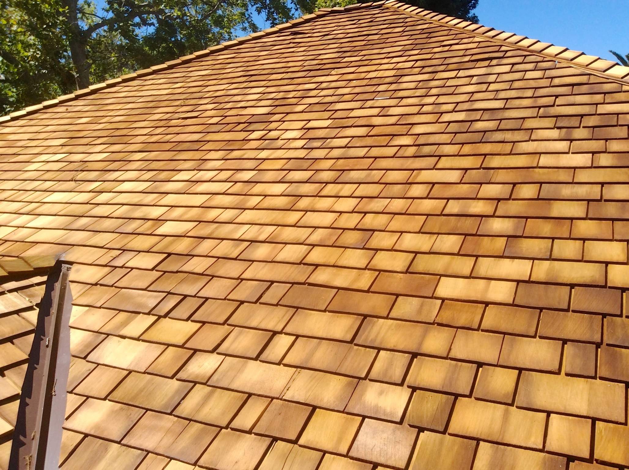 Custom Cedar Shake Roof Replacement for Saratoga Craftsman Home by Eastman Roofing & Waterproofing Inc.