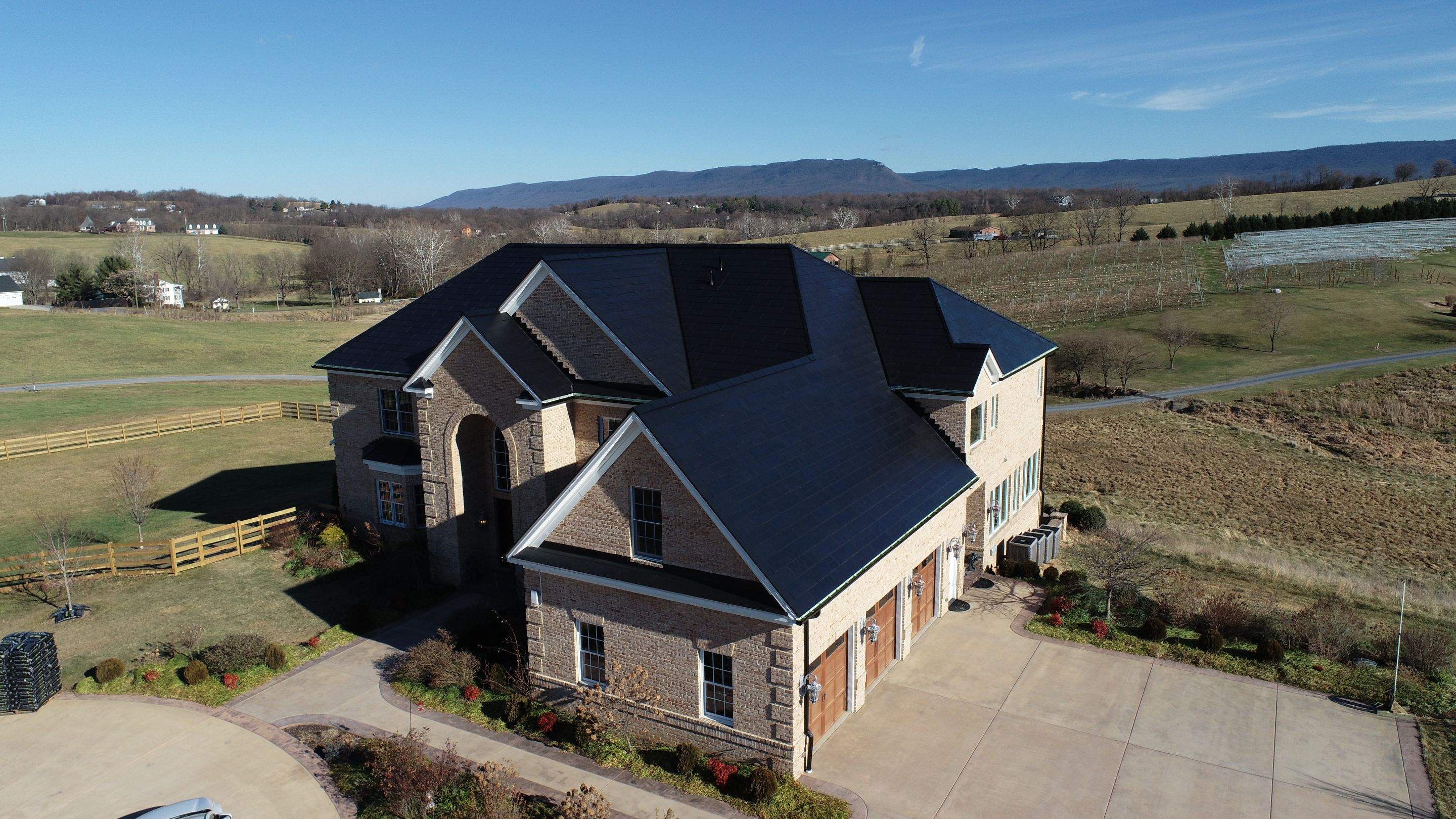 Tesla Solar Roof Replacement  by American Home Contractors
