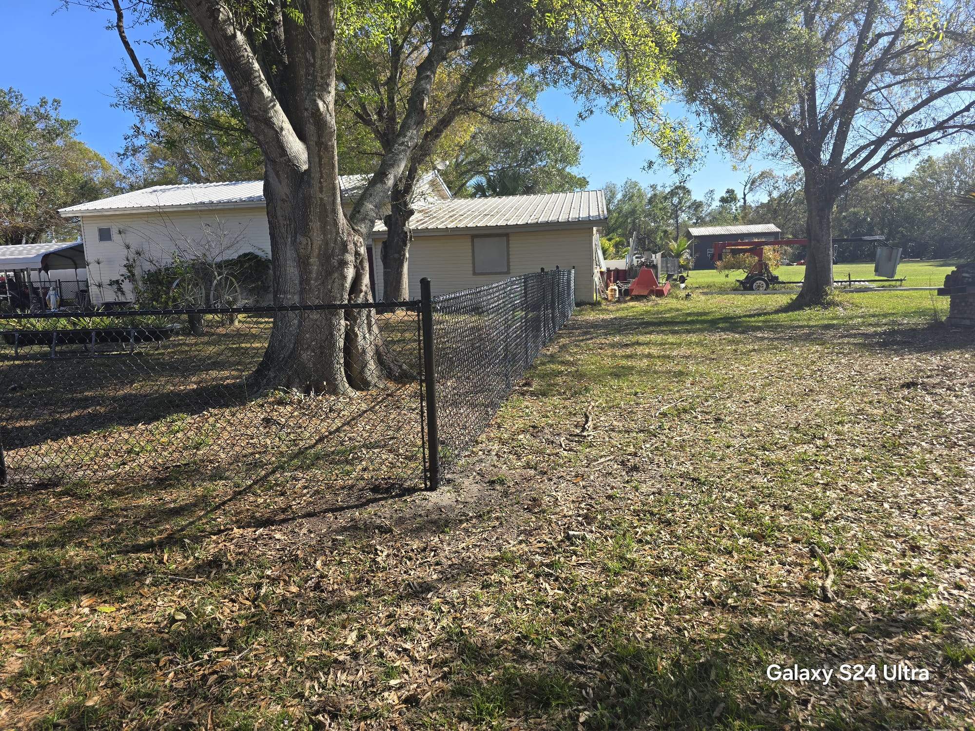 Black Chain Link Fence Installation in Port Charlotte by True Fence LLC