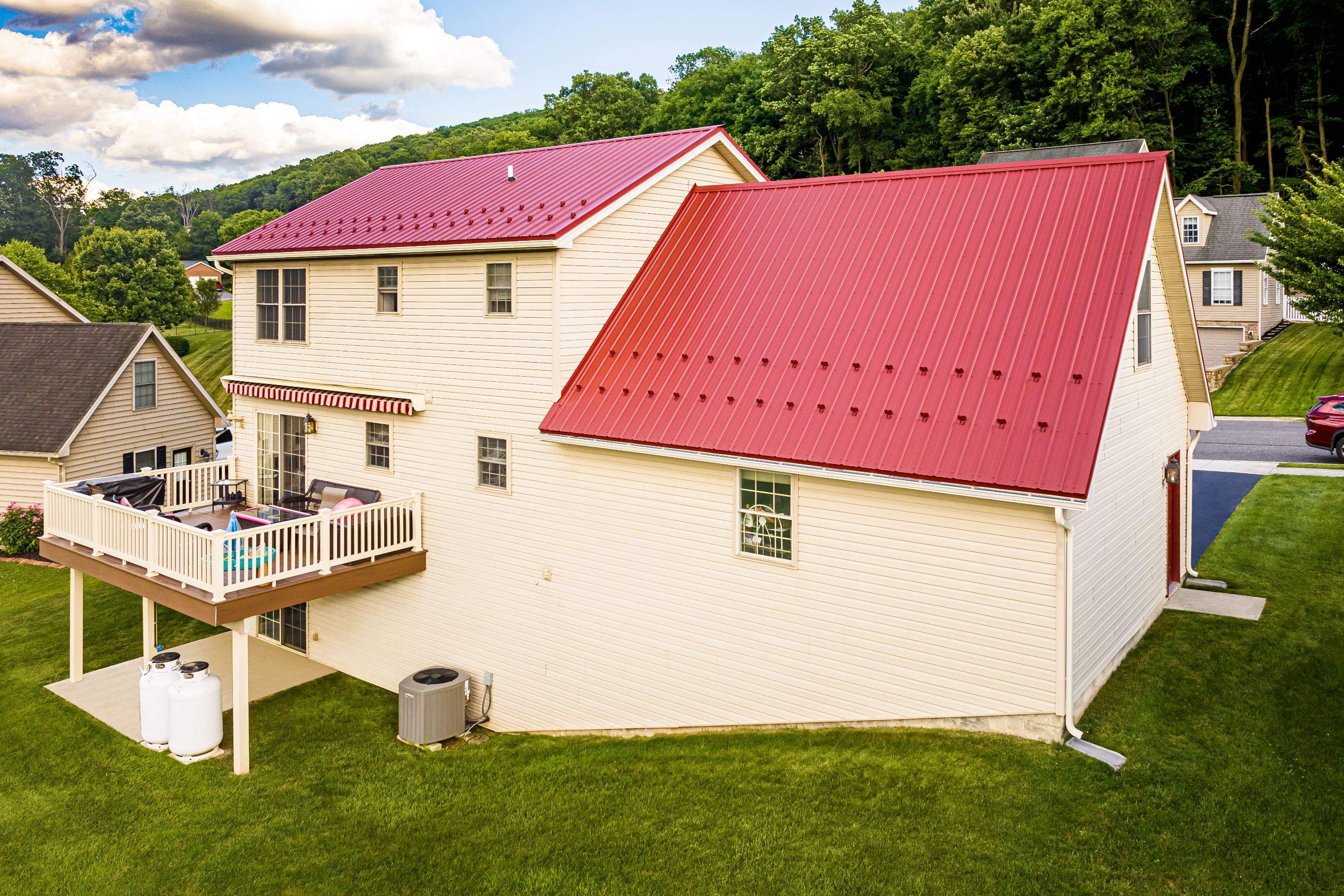 Metal roof-colonial red by Esh Builders
